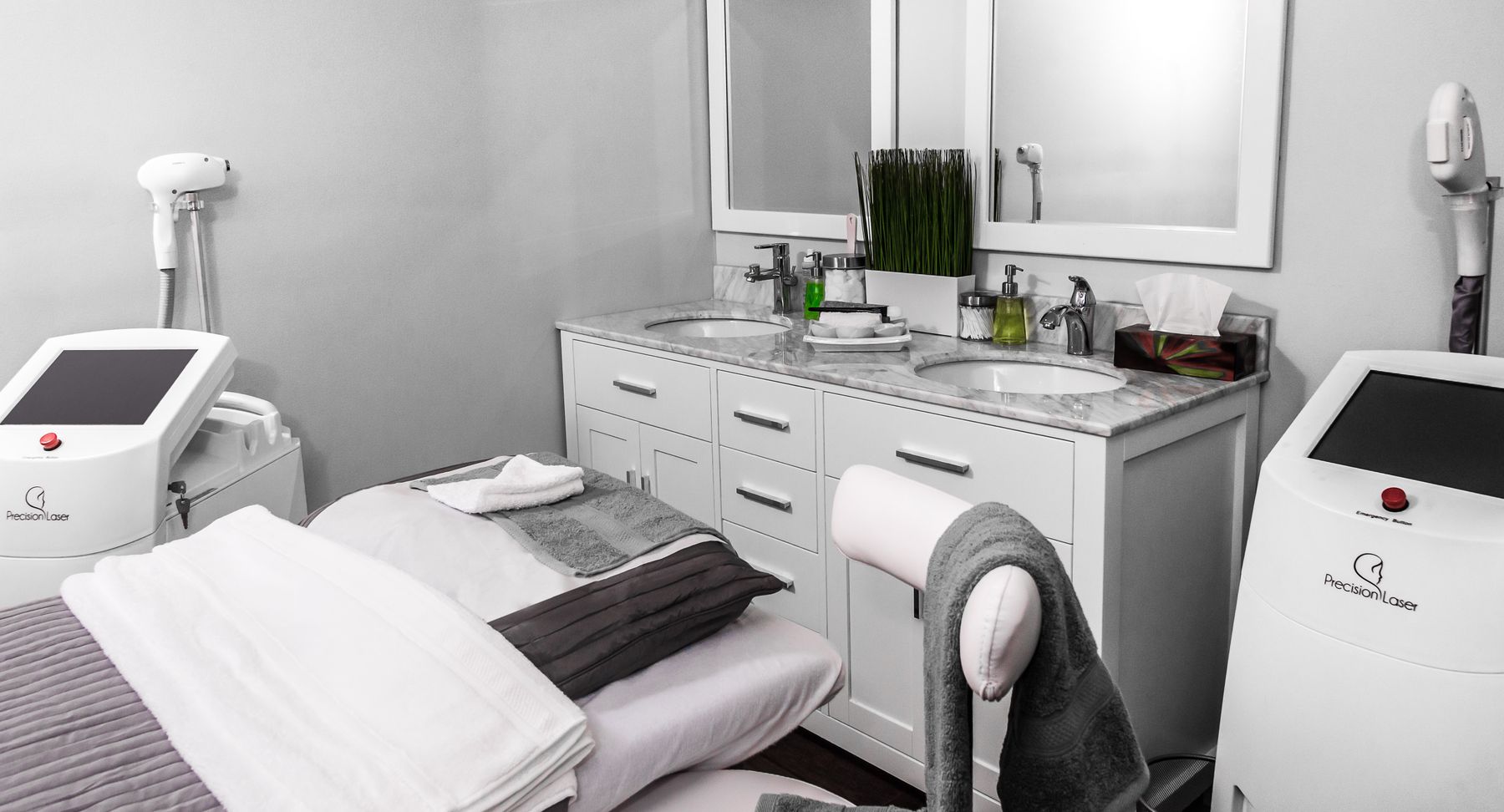Aesthetic clinic detail with treatment bed